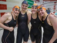 Scenes from the 3A Boys and Girls District 3 swimming championship