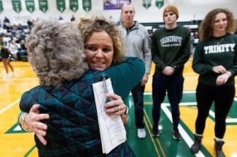 Trinity girls basketball celebrates head coach Kristi Britten’s milestone